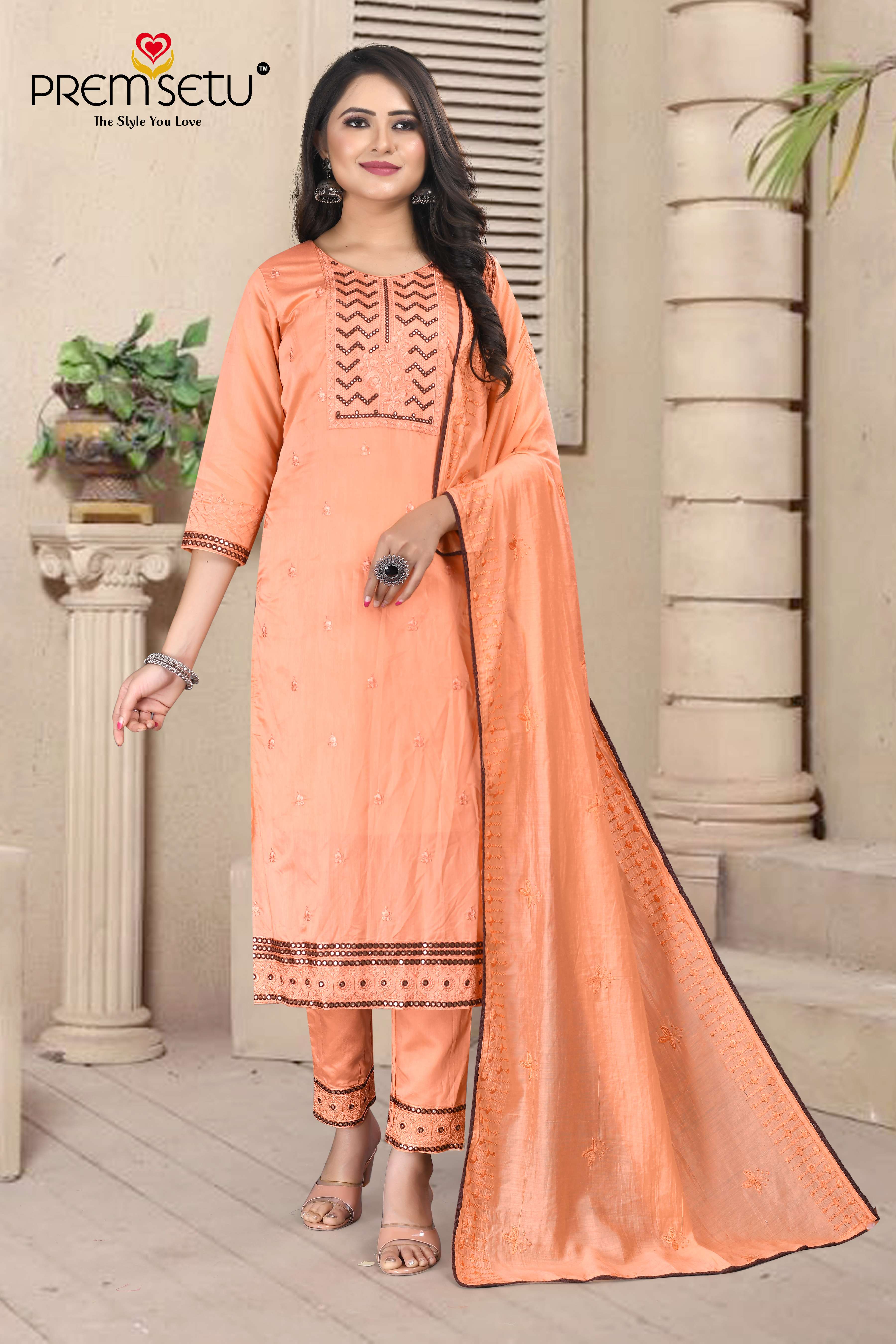 Premsetu Present Light Orange Heavy Kurti Pant With Dupatta Embroidery Work On Wholesale Price