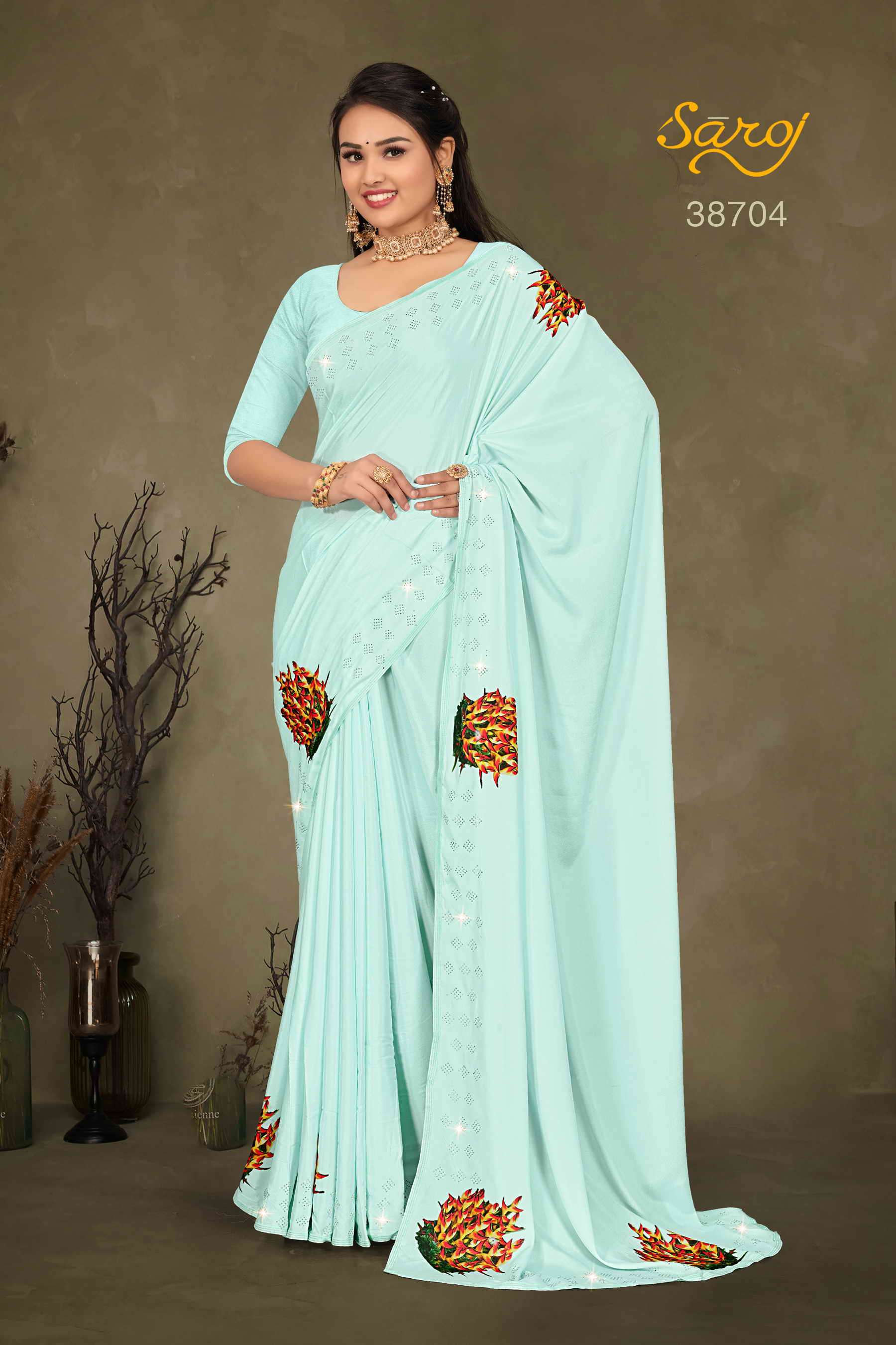 Saroj textile presents Tanmayi Designer sarees catalogue