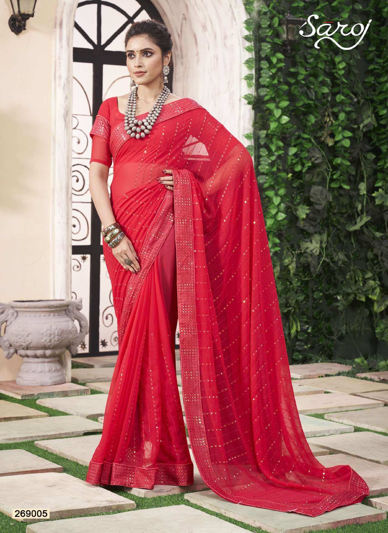 Saroj Shinning star Designer Georgette Saree Wholesale catalog
