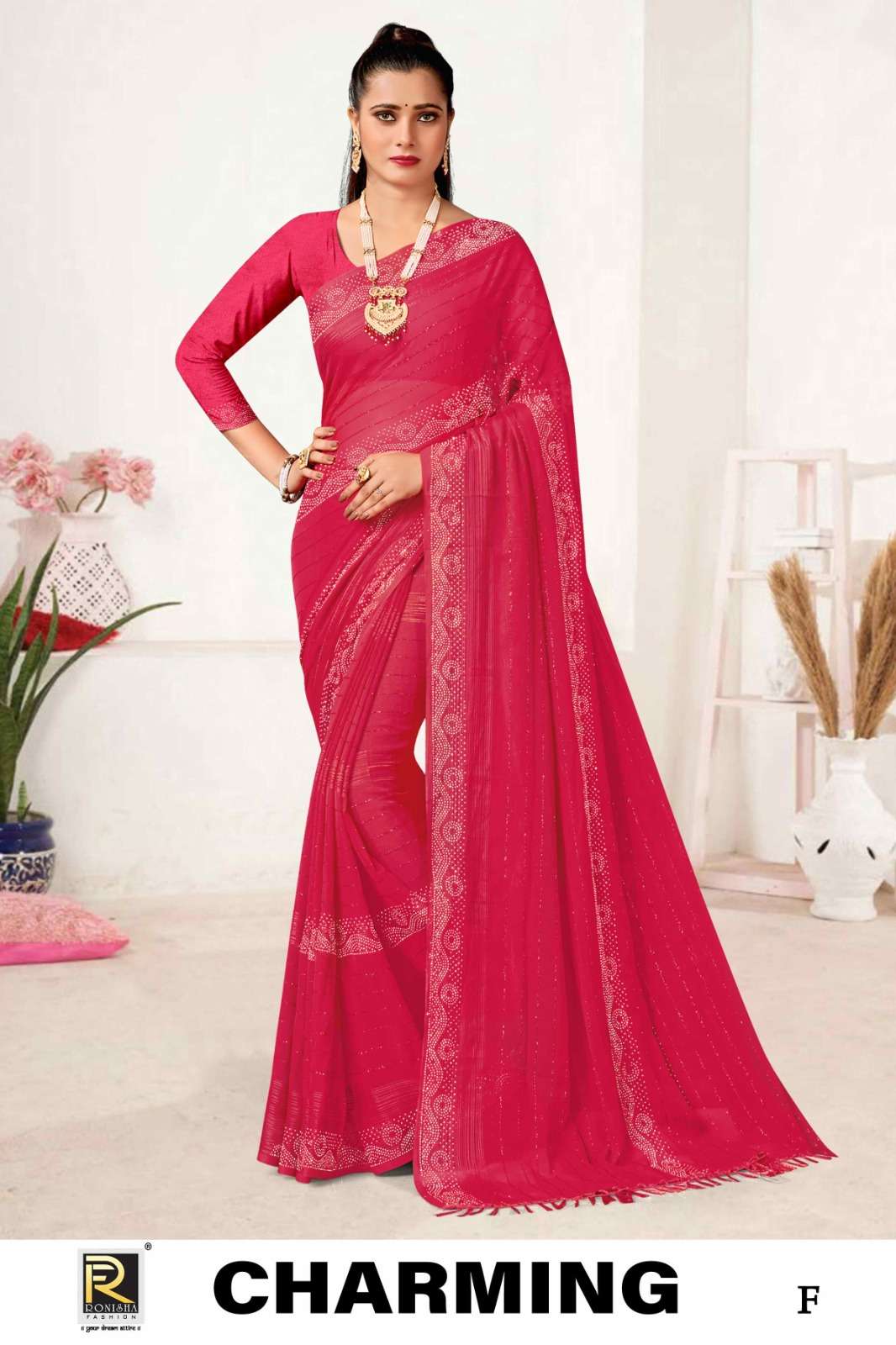 CHARMING  BY RONISHA SAREE  FANCY FABRICS SELF PETTERN WITH SIROSKI DIAMOND WORK SUPER HIT COLLECTION 