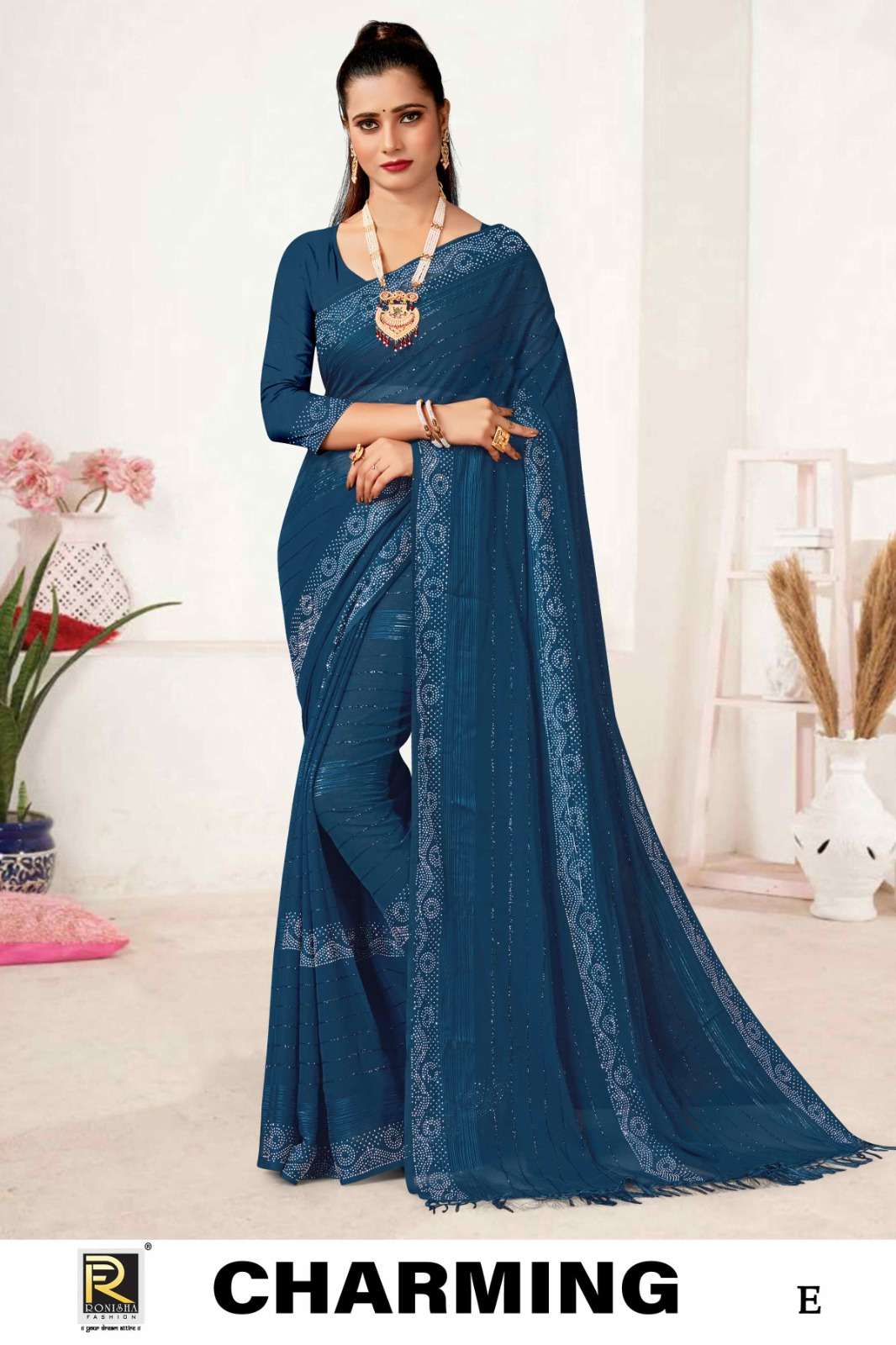 CHARMING  BY RONISHA SAREE  FANCY FABRICS SELF PETTERN WITH SIROSKI DIAMOND WORK SUPER HIT COLLECTION 