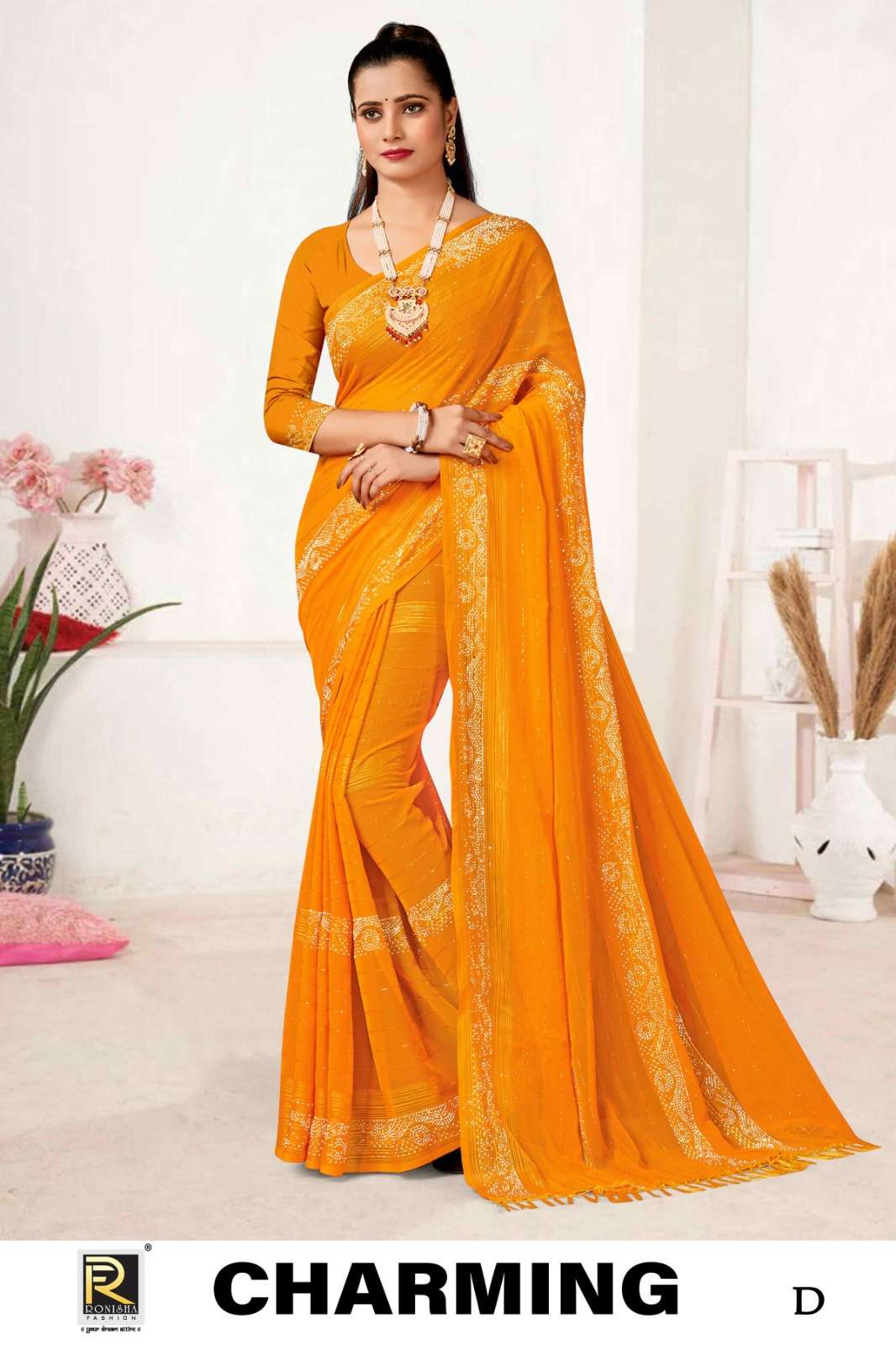 CHARMING  BY RONISHA SAREE  FANCY FABRICS SELF PETTERN WITH SIROSKI DIAMOND WORK SUPER HIT COLLECTION 