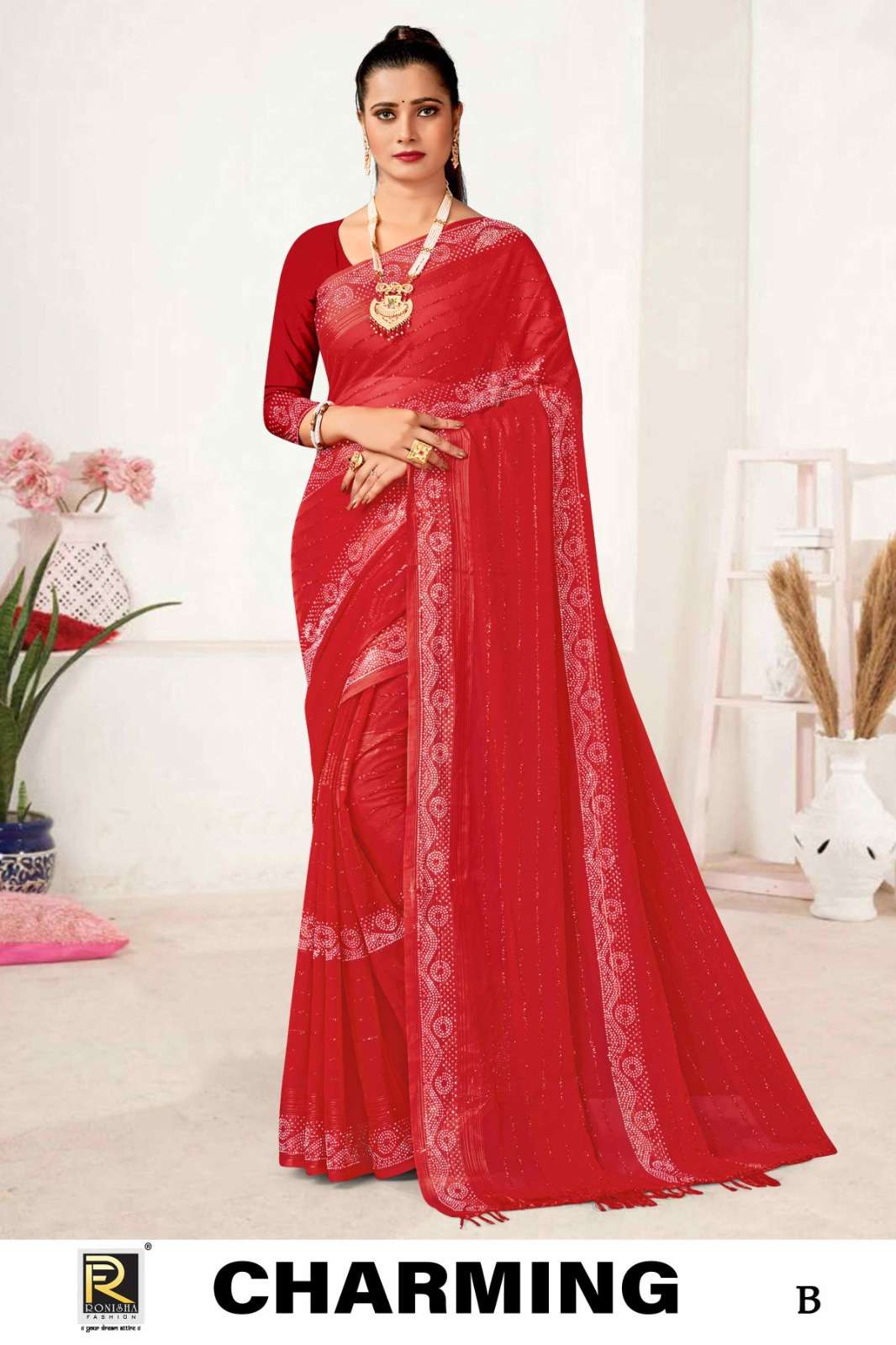 CHARMING  BY RONISHA SAREE  FANCY FABRICS SELF PETTERN WITH SIROSKI DIAMOND WORK SUPER HIT COLLECTION 