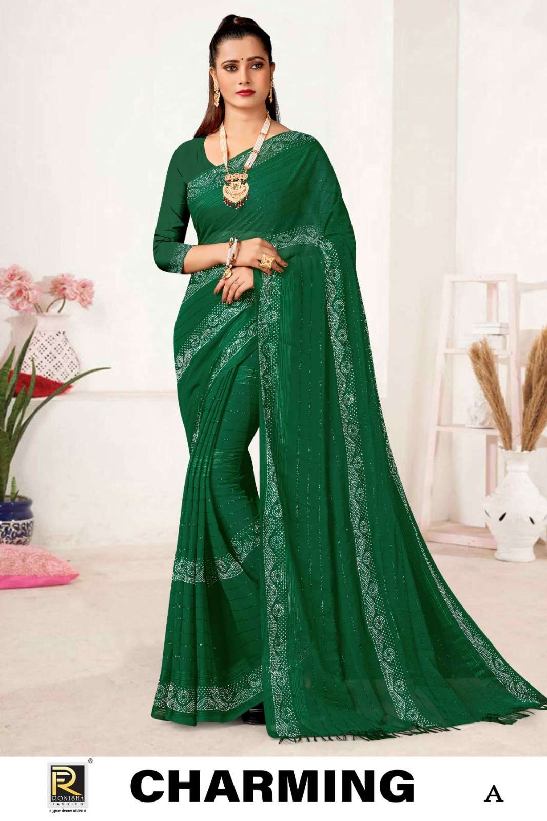 CHARMING  BY RONISHA SAREE  FANCY FABRICS SELF PETTERN WITH SIROSKI DIAMOND WORK SUPER HIT COLLECTION 