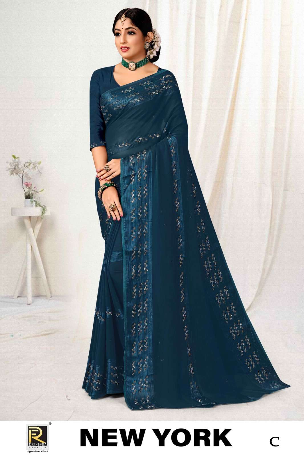NEW YORK  BY RONISHA SAREE  FANCY FABRICS SELF PETTERN WITH SIROSKI DIAMOND SUPER HIT COLLECTION 