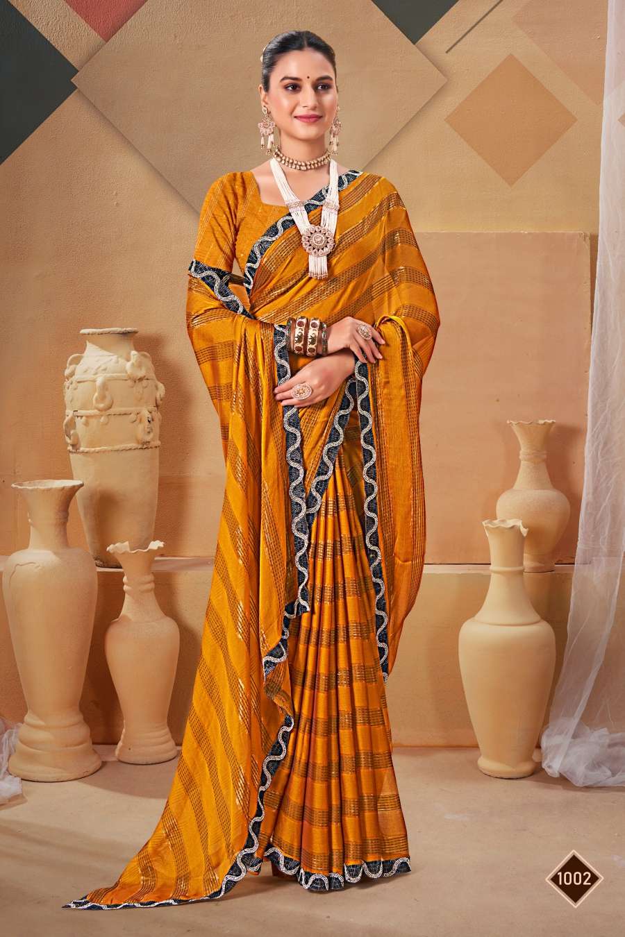 Saroj Queen Designer Fancy Fabric Saree Wholesale catalog