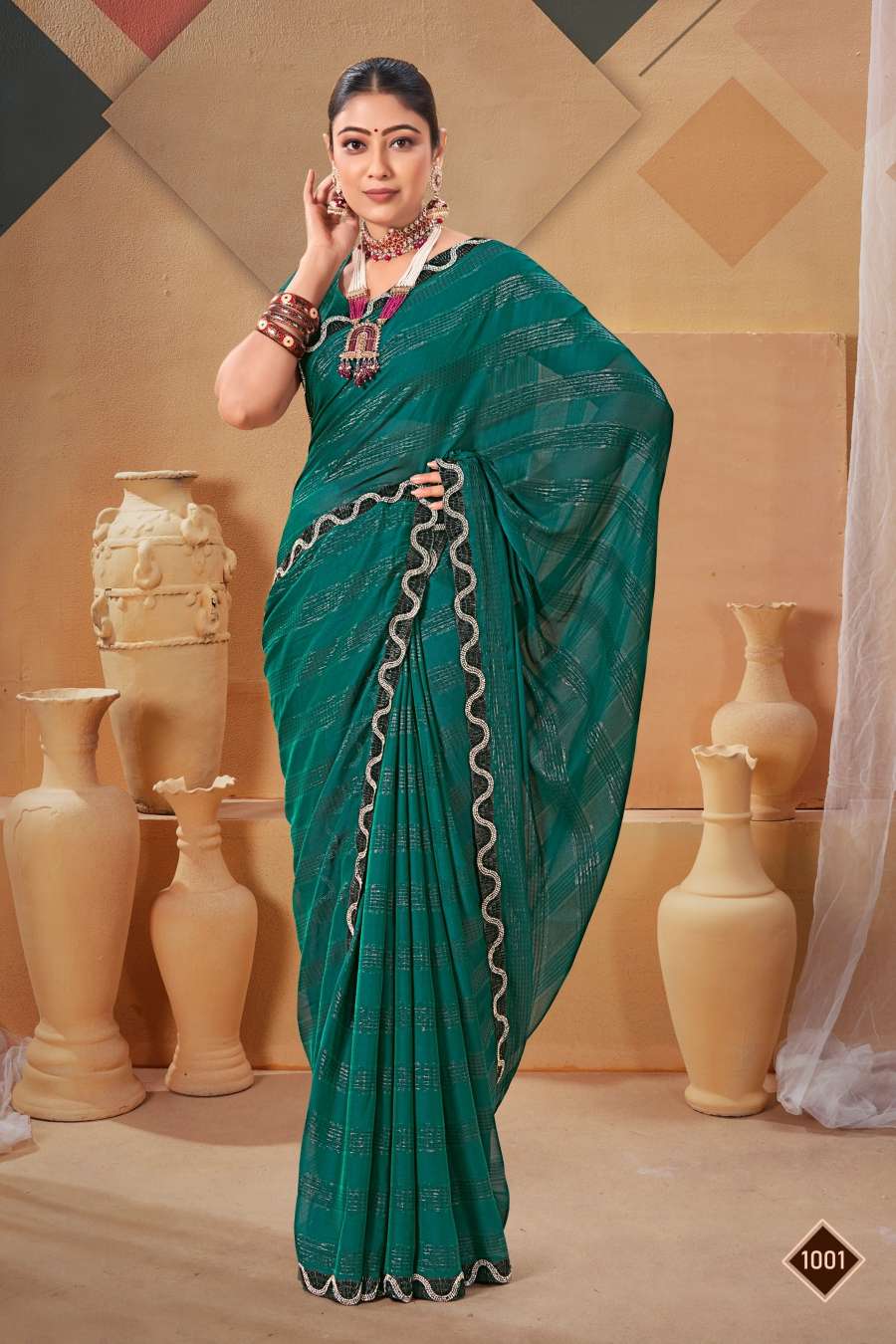 Saroj Queen Designer Fancy Fabric Saree Wholesale catalog