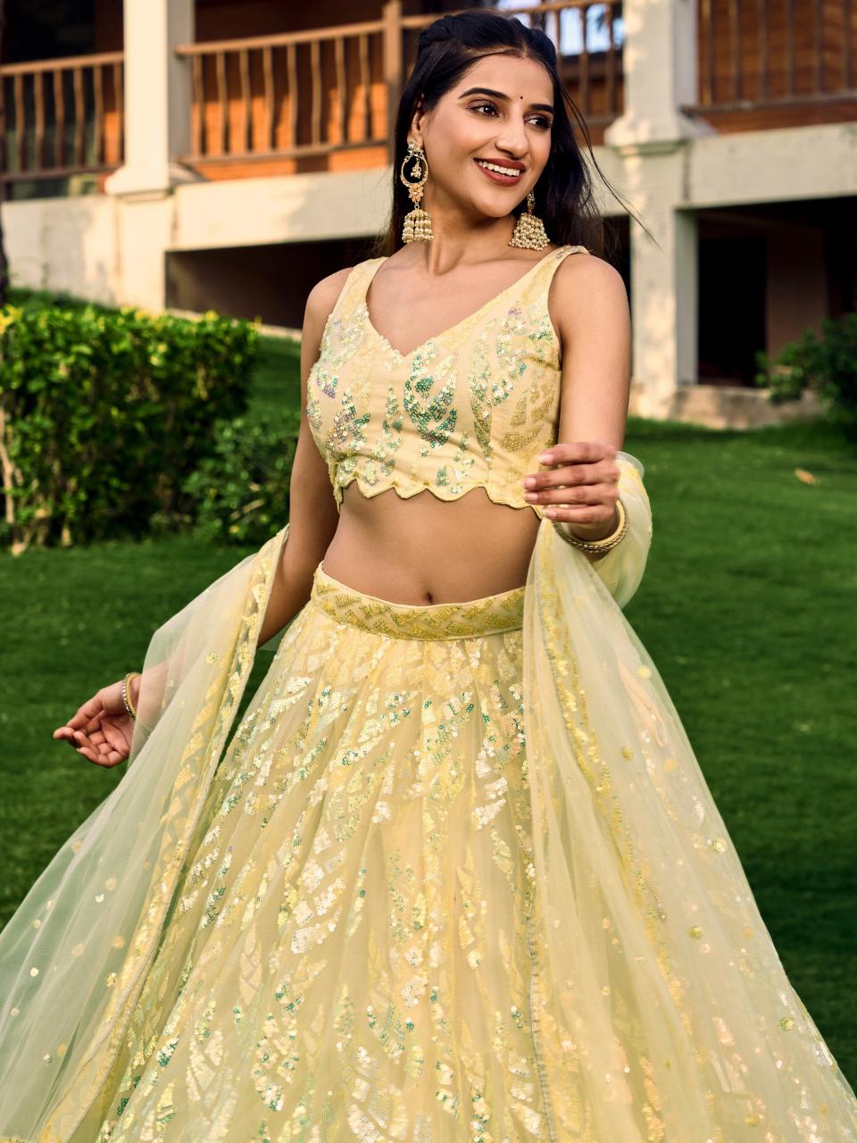Sabella 5101 Yellow catalog best lehenga designers in india