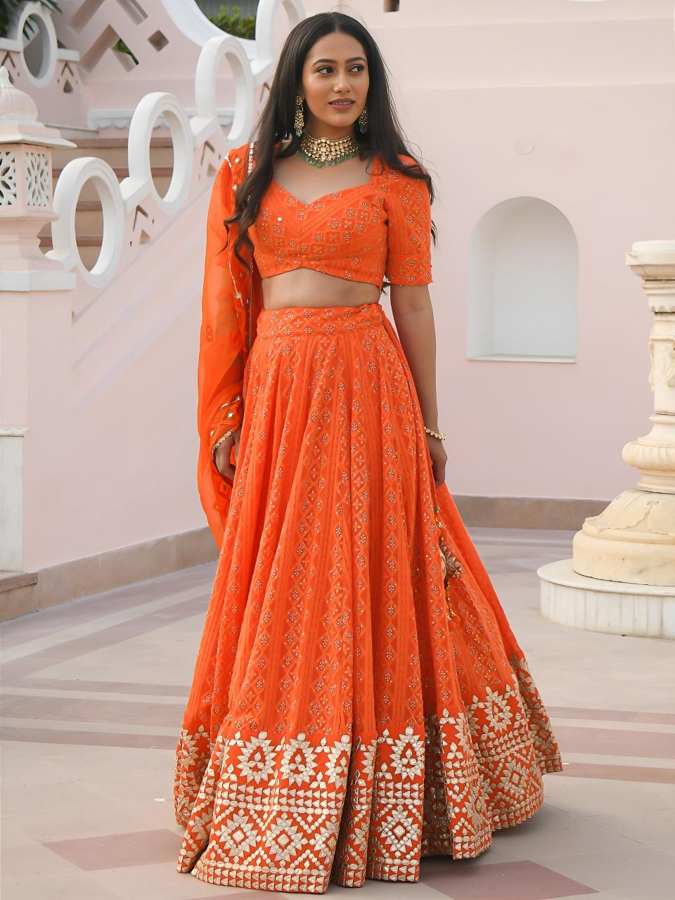 Sabella 7081 Orange catalog lehenga choli wholesale suppliers