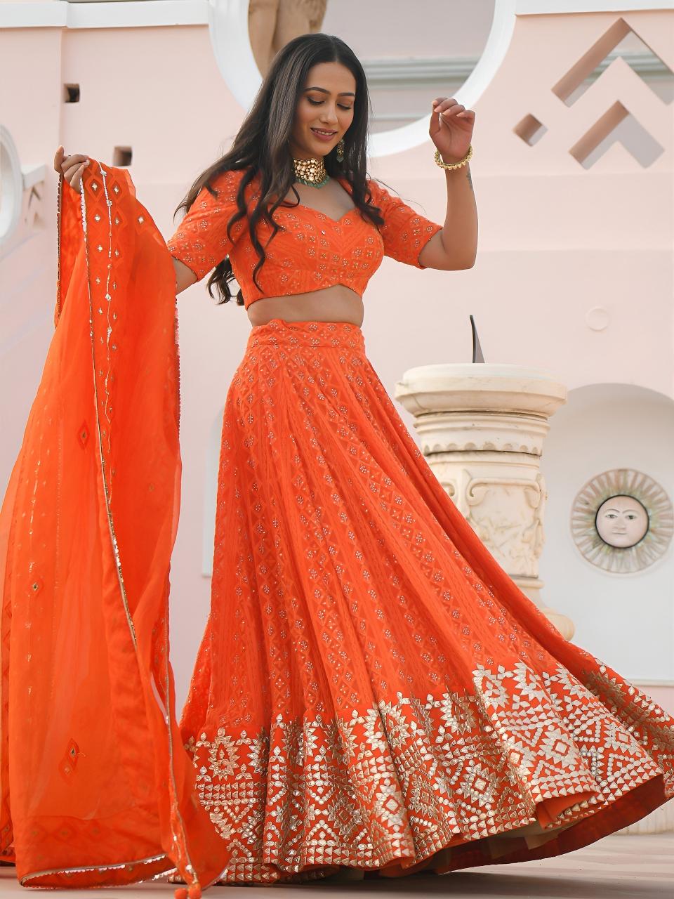 Sabella 7081 Orange catalog lehenga choli wholesale suppliers
