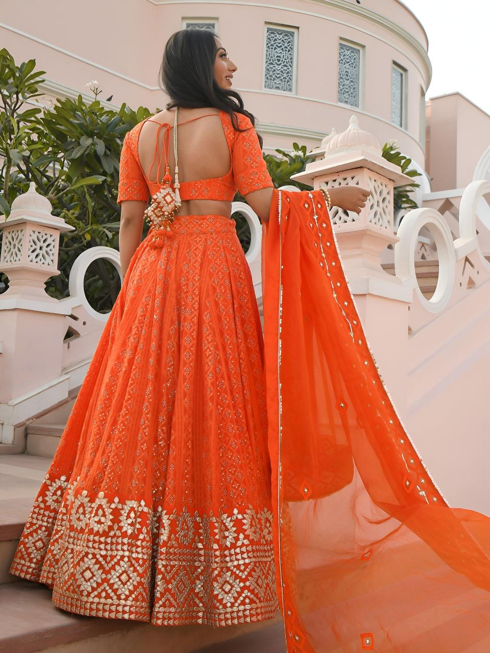 Sabella 7081 Orange catalog lehenga choli wholesale suppliers