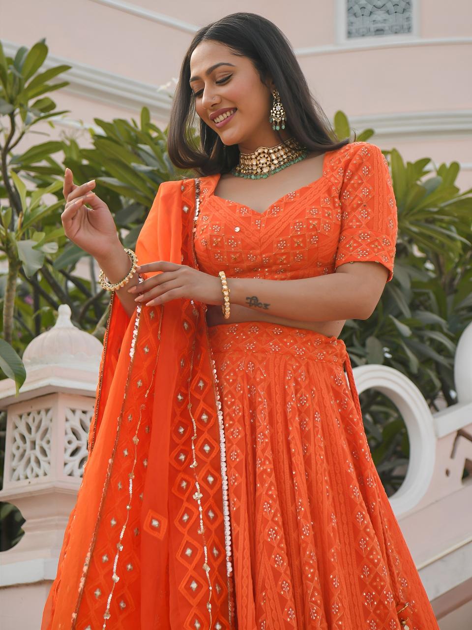 Sabella 7081 Orange catalog lehenga choli wholesale suppliers